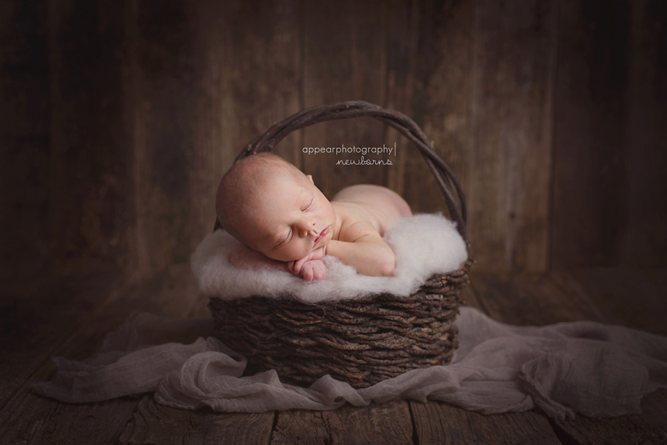 Appear Photography, Hoover, Birmingham, AL newborn photographer, rustic, wood background, baby in basket, wool fluff, cheesecloth