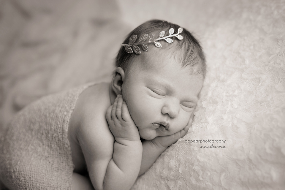Appear Photography, Hoover, Birmingham, AL newborn baby photographer, hands on face, leaf laurel crown, black and white
