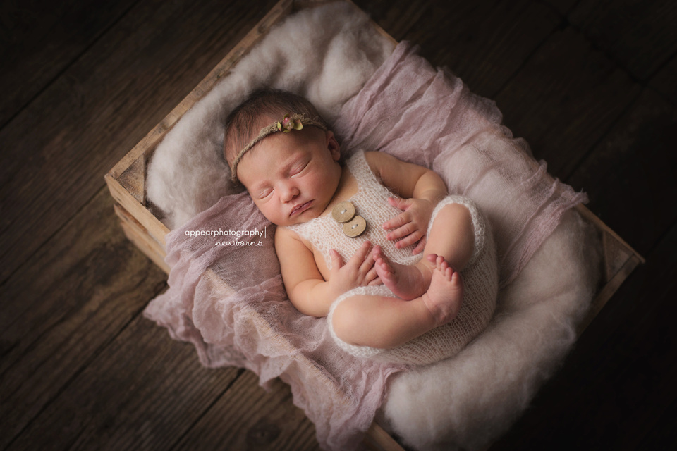 Appear Photography, Hoover, Birmingham, AL newborn baby photographer, baby in wooden crate, rustic, newborn mohair romper, wooden buttons