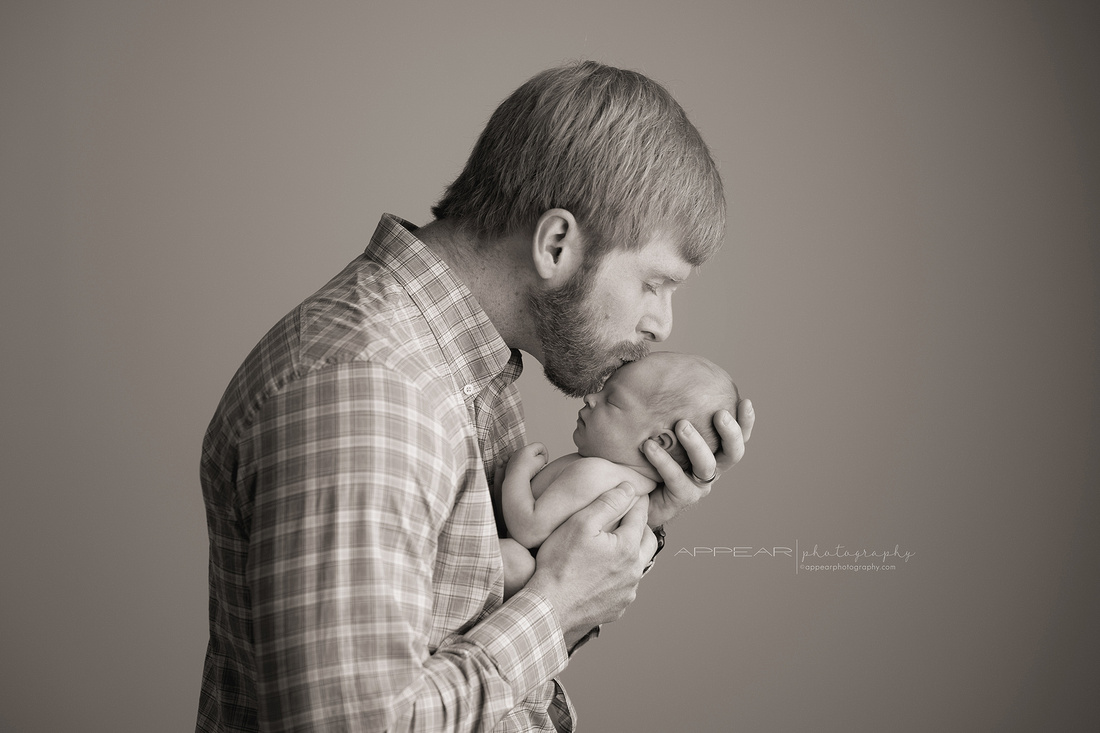 Appear Photography, Birmingham, AL newborn baby photographer, father and child, kiss